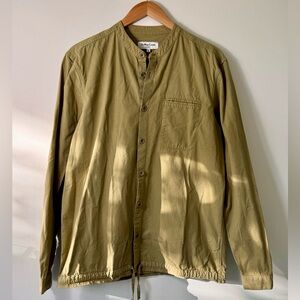 You must create. London. Collarless and drawstring at hem